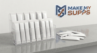 Blank white supplement sachets in a clear counter display, ready for white label branding